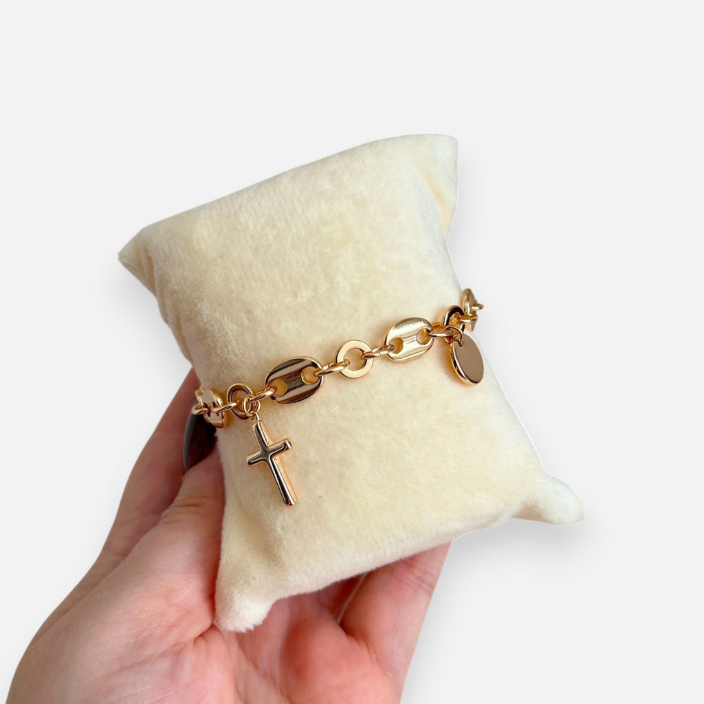 Pulsera Hv Hermanas Villegas de cobre con enchapado en oro rosé, cadena grano de café con dije de cruz y círculo.