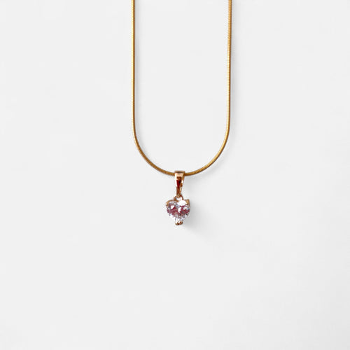 Cadena Hv Hermanas Villegas estilo cola de ratón en oro rosé con dije de circonia en forma de corazón