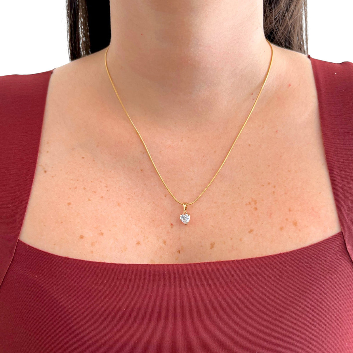 Cadena Hv Hermanas Villegas estilo cola de ratón en oro rosé con dije de corazón y circonia brillante