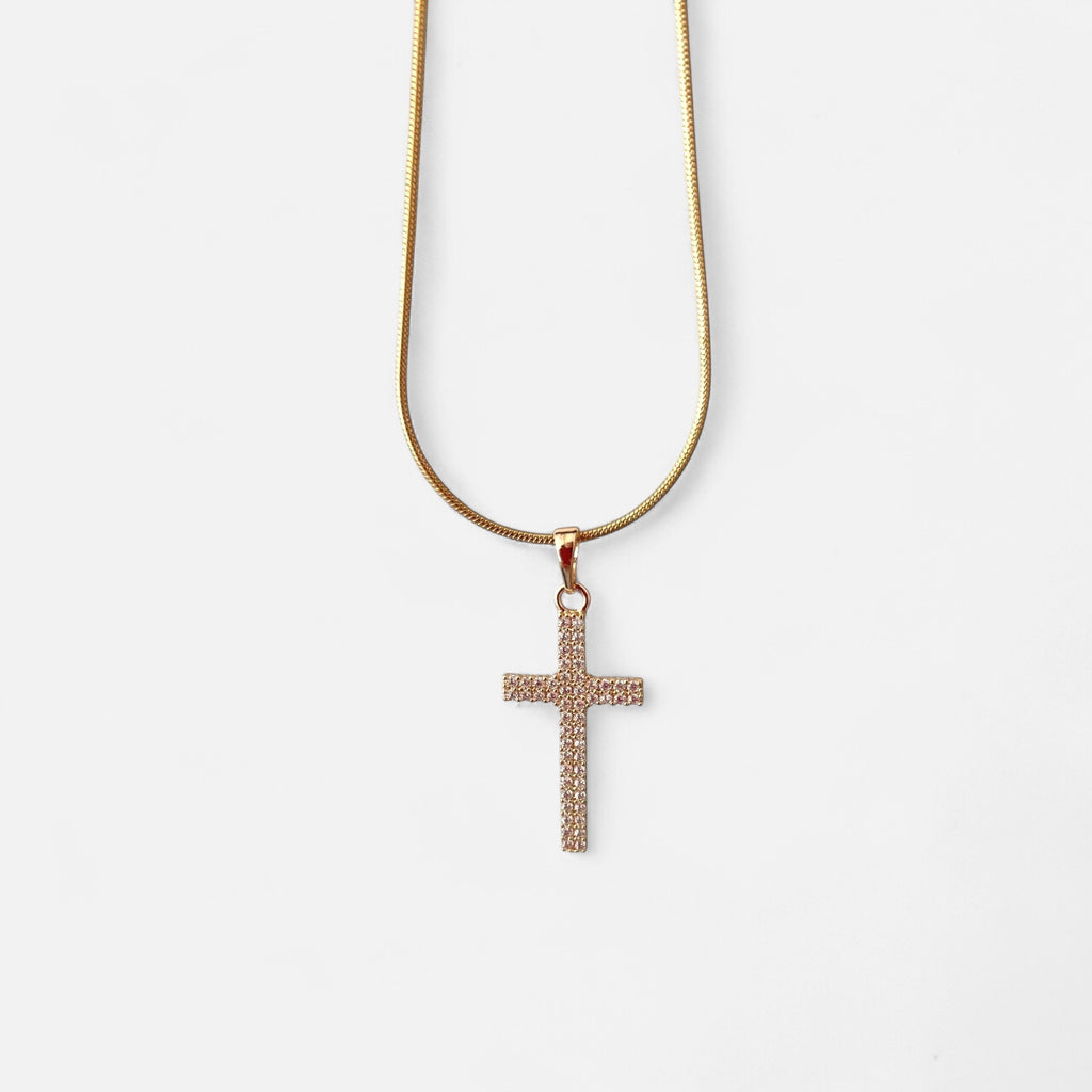 Collar Hv Hermanas Villegas de cadena cola de ratón en oro rosé con dije de cruz engastado en circonias brillantes.