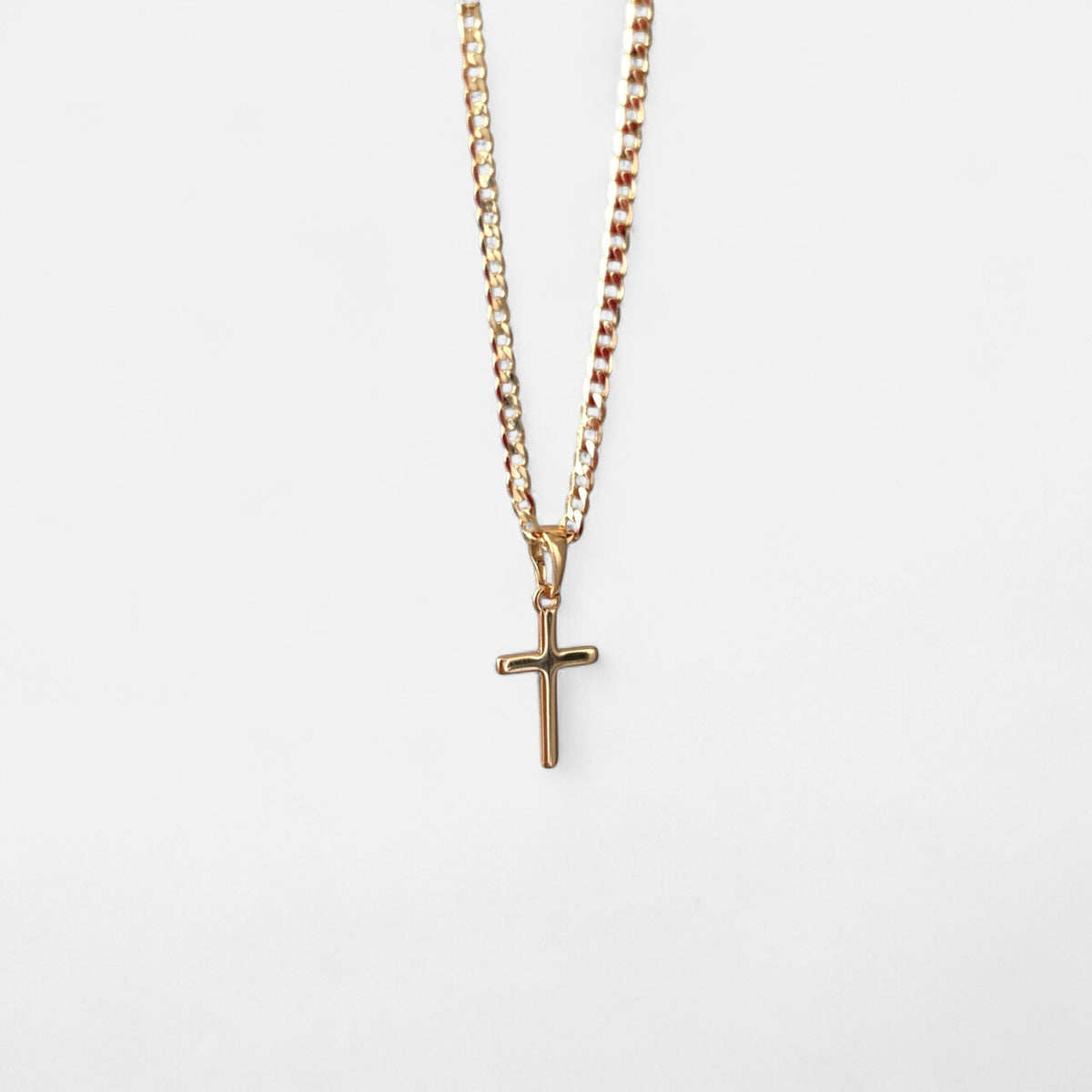 Collar Hv Hermanas Villegas de cadena lomo en cobre con baño de oro rosé y dije de cruz lisa clásica