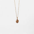 Collar Hv Hermanas Villegas con cadena entorchada y medalla ovalada del Señor de la Misericordia en oro rosé.
