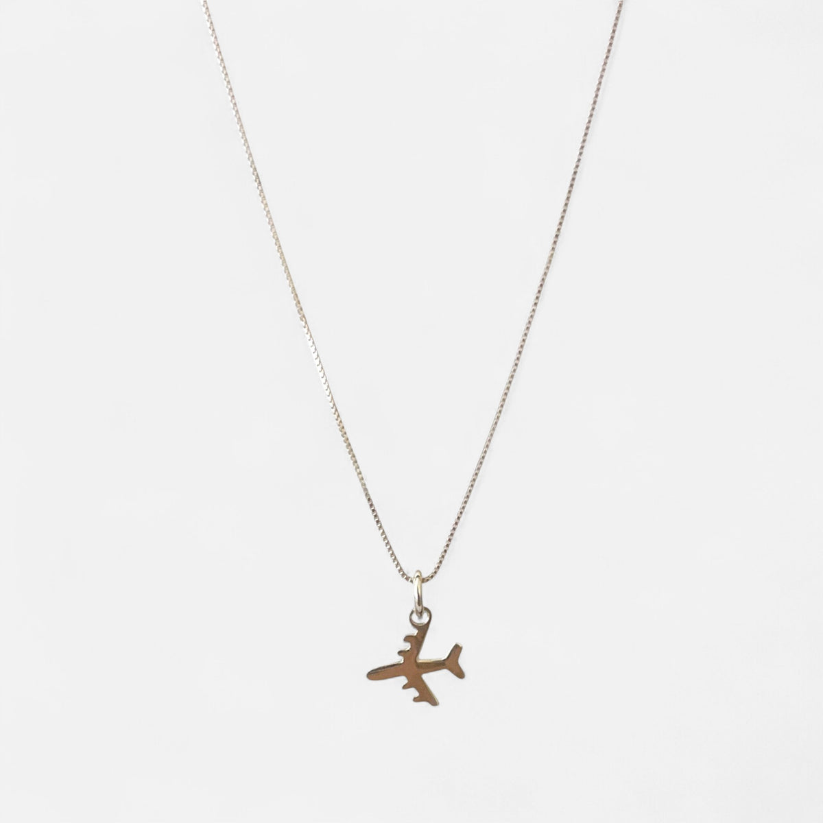 Collar Hv Hermanas Villegas de plata 925 con cadena veneciana y dije minimalista en forma de avión