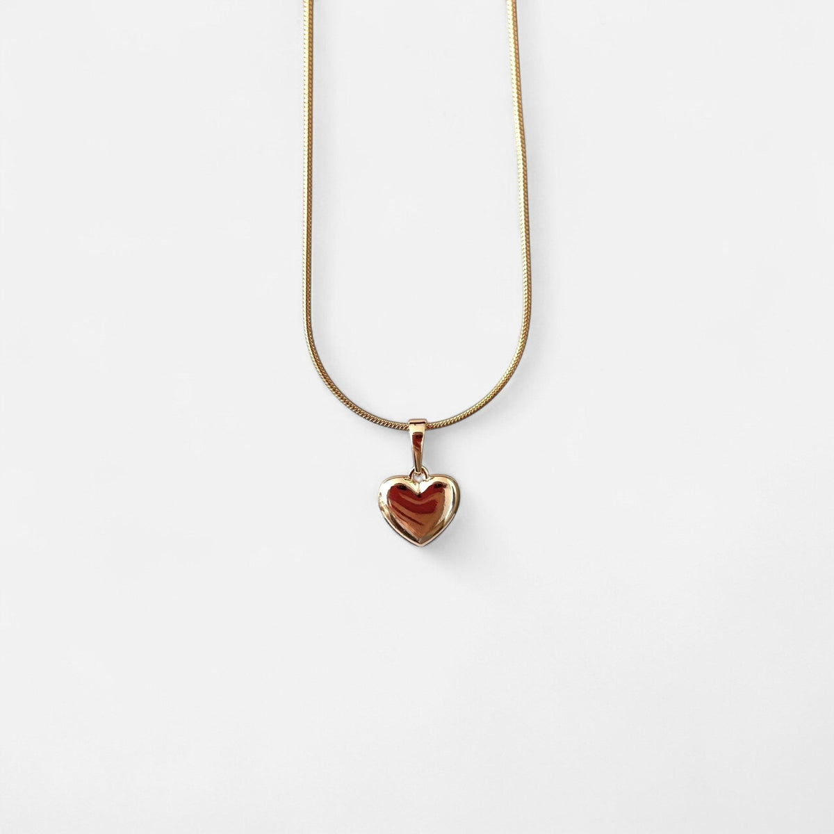 Collar Hv Hermanas Villegas con cadena cola de ratón y dije de corazón inflado liso en baño de oro rosé