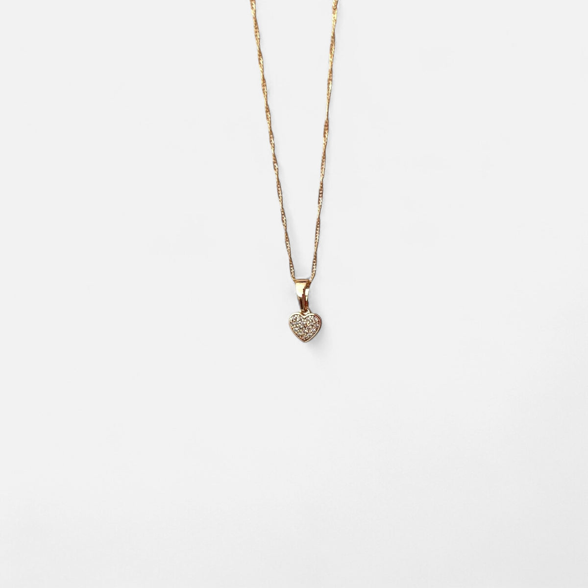 Collar Hv Hermanas Villegas con cadena Singapur en oro rosé y dije de corazón con circonias en engaste pavé