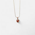 Collar Hv Hermanas Villegas con cadena anchor y dije de corazón inflado en cobre con baño de oro rosé brillante.