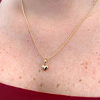 Collar Hv Hermanas Villegas con cadena grumet y dije de corazón pequeño inflado en baño de oro rosé
