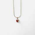 Collar Hv Hermanas Villegas con cadena cola de ratón y dije de corazón inflado en baño de oro rosé pulido