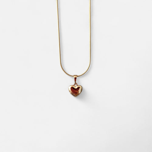 Collar Hv Hermanas Villegas con cadena cola de ratón y dije de corazón inflado en baño de oro rosé pulido