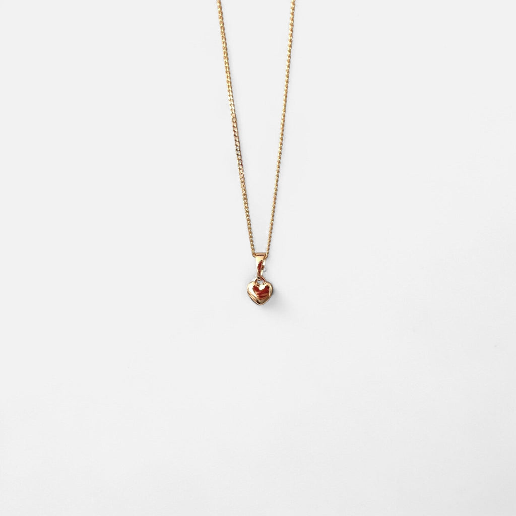 Collar Hv Hermanas Villegas con cadena grumet y dije de corazón pequeño inflado en baño de oro rosé pulido