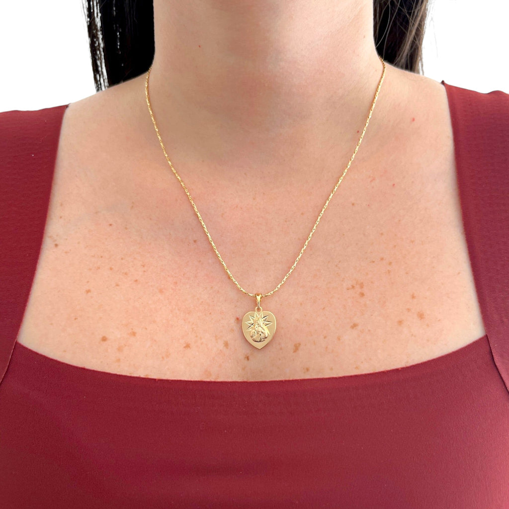 Collar Hv Hermanas Villegas con cadena entorchada y medalla corazón reversible de la Virgen del Carmen en oro rosé