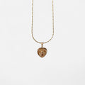 Collar Hv Hermanas Villegas con cadena entorchada y medalla de corazón reversible de la Virgen del Carmen en oro rosé