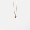 Collar Hv Hermanas Villegas con cadena veneciana y dije de estrella lisa en cobre con baño de oro rosé