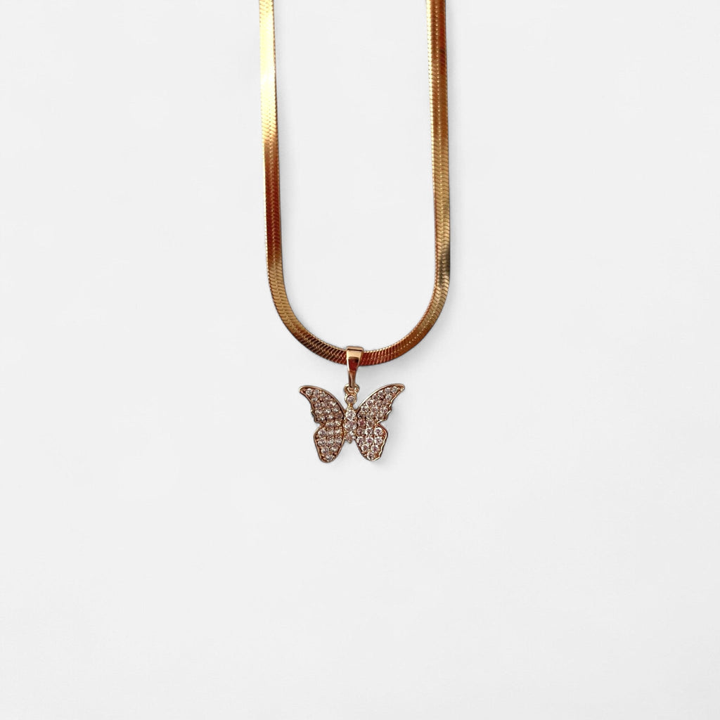 Collar Hv Hermanas Villegas de cadena serpiente plana en oro rosé con dije de mariposa brillante de circonias