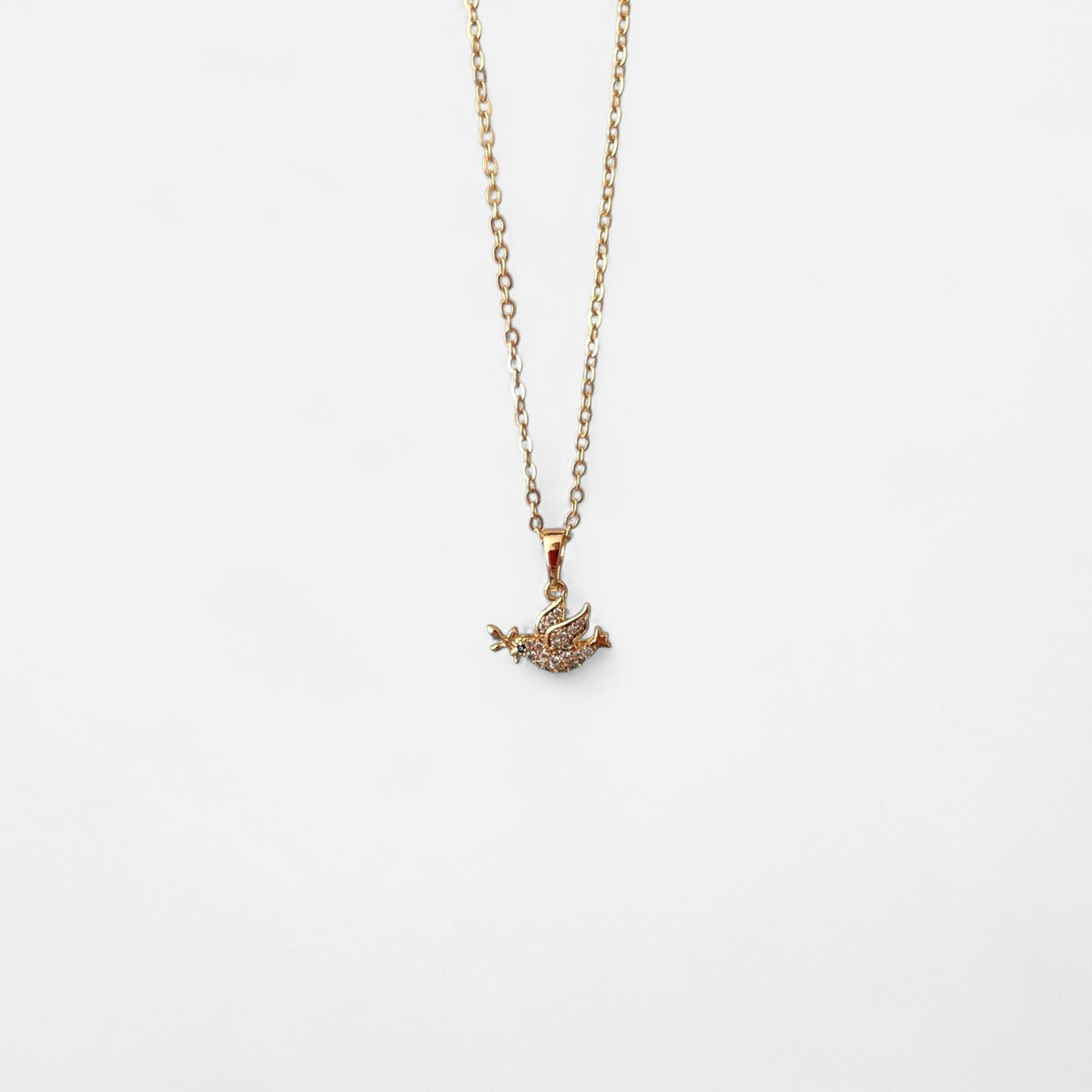 Collar Hv Hermanas Villegas de cadena force en oro rosé con dije de paloma del Espíritu Santo y circonias brillantes