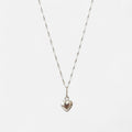 Collar Hv Hermanas Villegas de plata 925 con cadena tejido Singapur y dije de corazón inflado pulido a espejo.