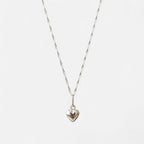 Collar Hv Hermanas Villegas de plata 925 con cadena tejido Singapur y dije de corazón inflado pulido a espejo.