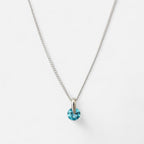Collar Hv Hermanas Villegas de plata 925 con cadena Singapur y dije de punto de luz en cristal color azul celeste