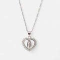 Collar Hv Hermanas Villegas de plata 925 con dije de corazón, circonitas y la Virgen de Guadalupe en relieve.