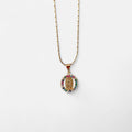 Collar Hv Hermanas Villegas con cadena entorchada en oro rosé y medalla de la Virgen de Guadalupe con circonias color