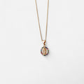 Collar Hv Hermanas Villegas de cadena grumet en oro rosé con medalla de la Virgen de Guadalupe y circonias de colores