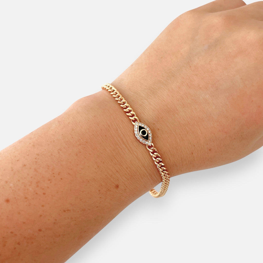 Pulsera Hv Hermanas Villegas estilo cubano en oro rosa con dije de ojo turco negro y circones brillantes