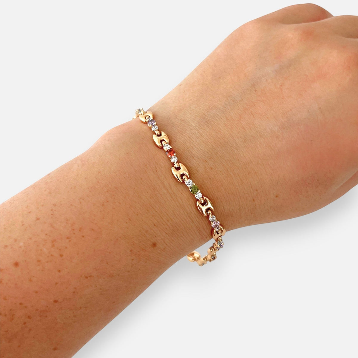 Pulsera Hv Hermanas Villegas de eslabones marinero en oro rosa con circones multicolores