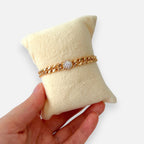 Pulsera Hv Hermanas Villegas de cadena grumet en oro rosa con dije central de cristal solitario y halo de circonias