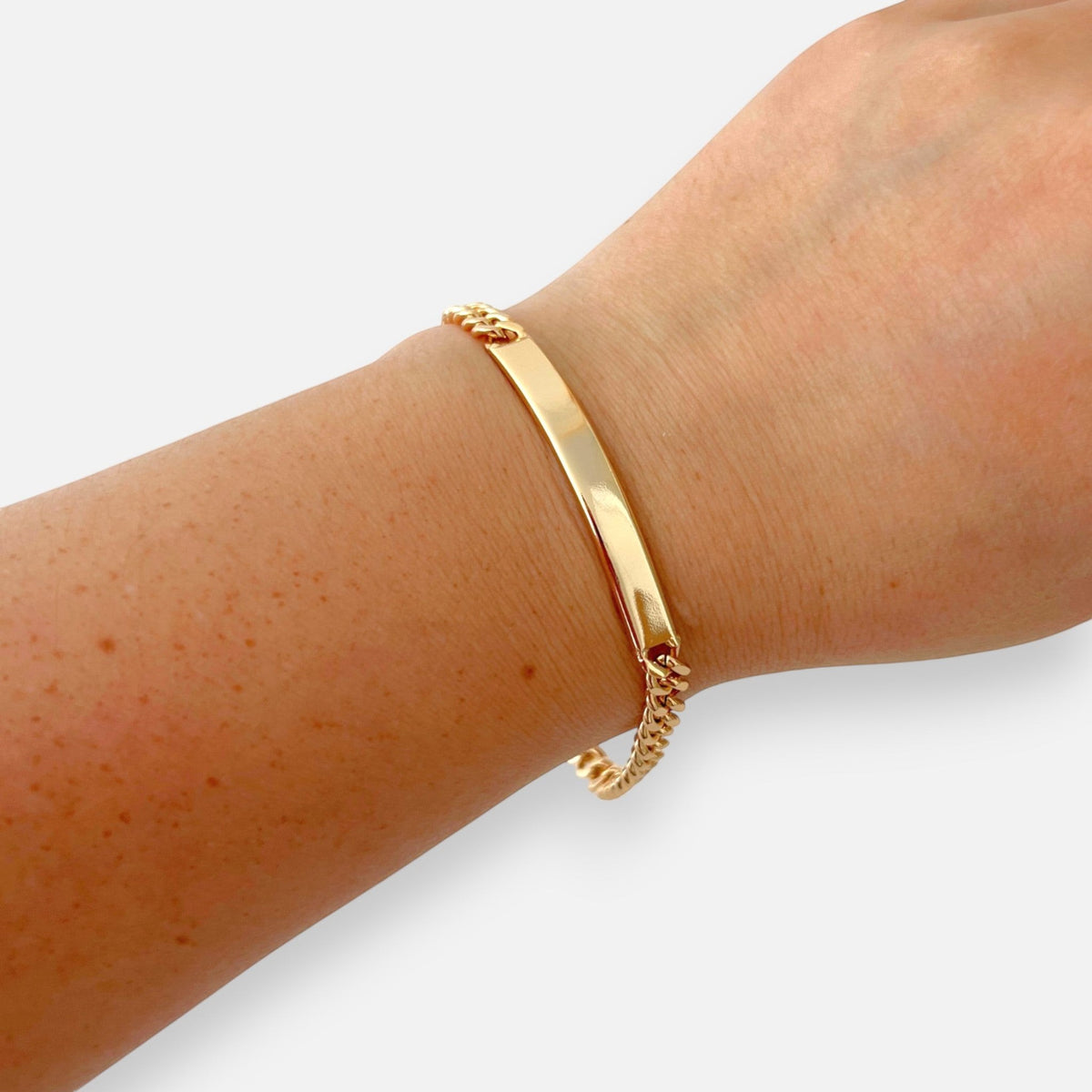 Pulsera Hv Hermanas Villegas de cadena grumet en oro rosa con placa central lisa pulida para grabar