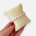 Pulsera Hv Hermanas Villegas de perlas ovaladas y balines en oro rosa
