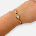 Pulsera Hv Hermanas Villegas de hilo con cuentas Murano, dije de Virgen de Guadalupe y circones multicolor en acero