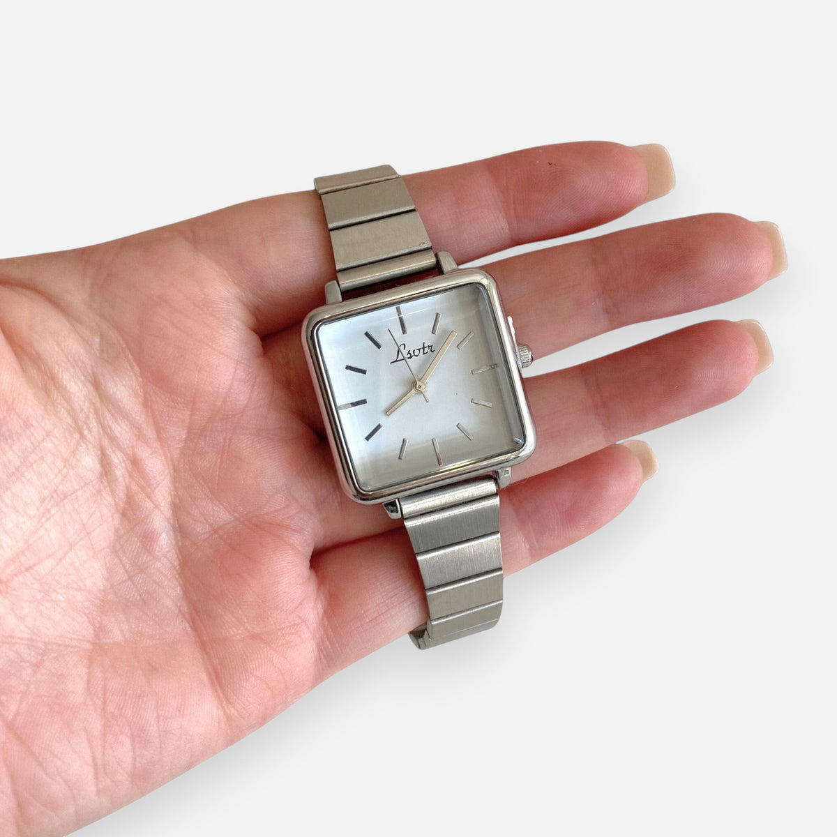 Reloj Hv Hermanas Villegas de caja cuadrada plateada con dial blanco y correa metálica extensible estilo vintage