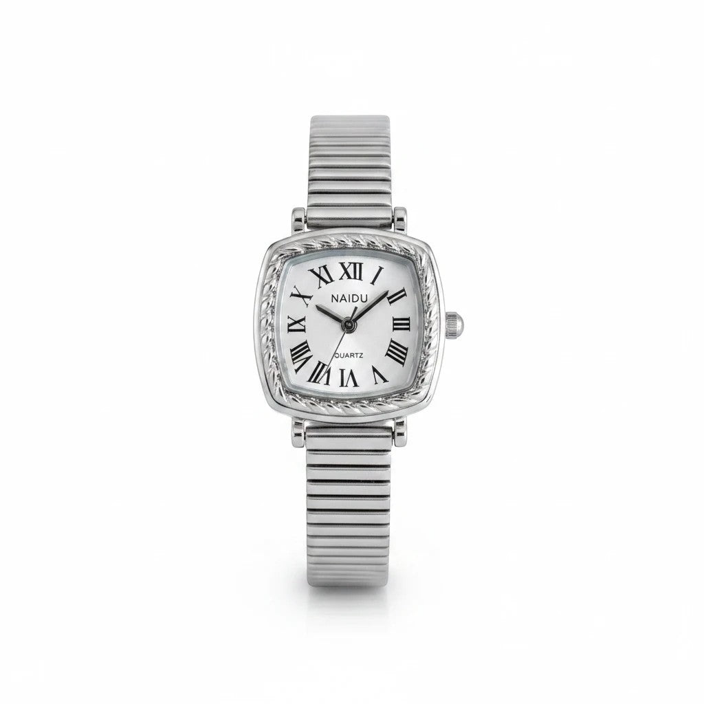 Reloj Hv Hermanas Villegas cuadrado plateado con bisel labrado, dial blanco y números romanos, estilo vintage.