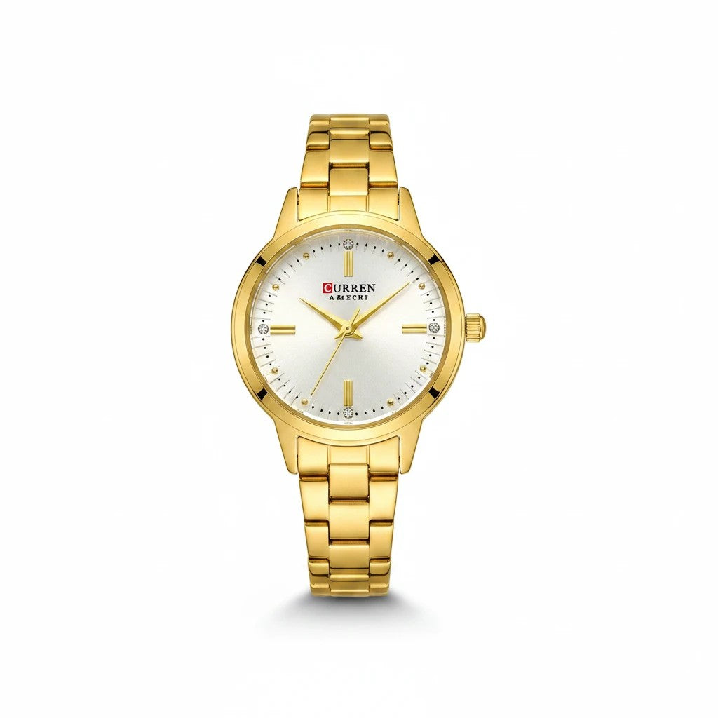 Reloj analógico Hv Hermanas Villegas dorado con caja redonda, dial satinado y detalles de circones en acero pulido.