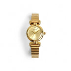 Reloj analógico Hv Hermanas Villegas de acero dorado con caja redonda, dial cepillado y detalles brillantes.