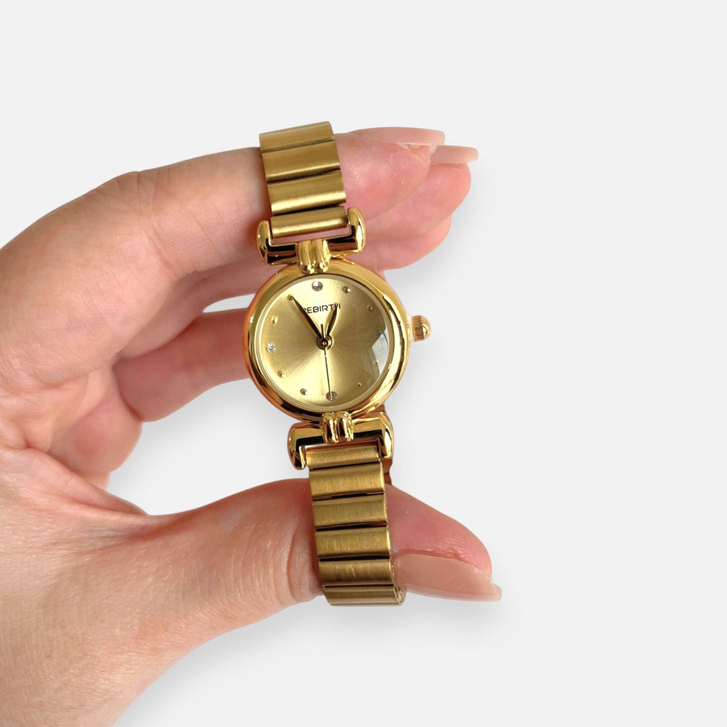 Reloj Hv Hermanas Villegas redondo de acero dorado con dial cepillado y correa de eslabones estilo vintage