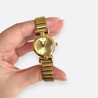 Reloj Hv Hermanas Villegas redondo de acero dorado con dial cepillado y correa de eslabones estilo vintage